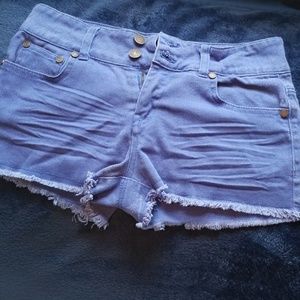 Periwinkle blue cut off shorts.